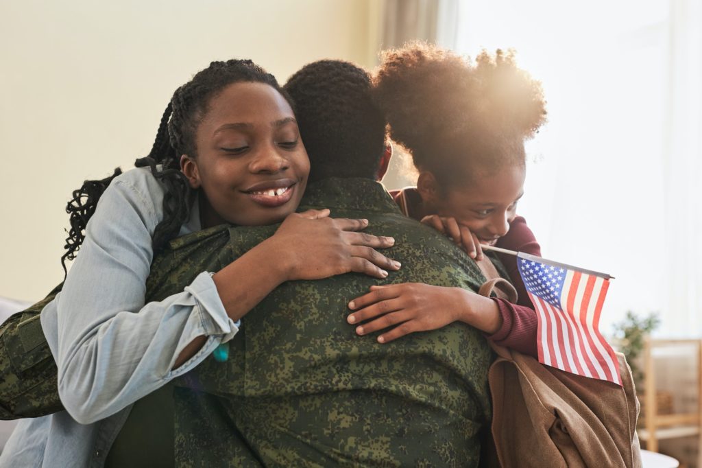 Family meeting their military dad